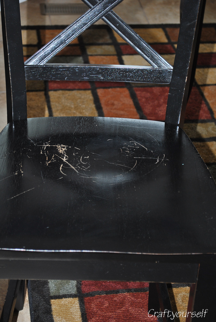 Scratched black chair